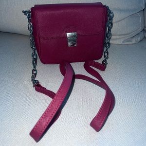 Red leather handbag. New